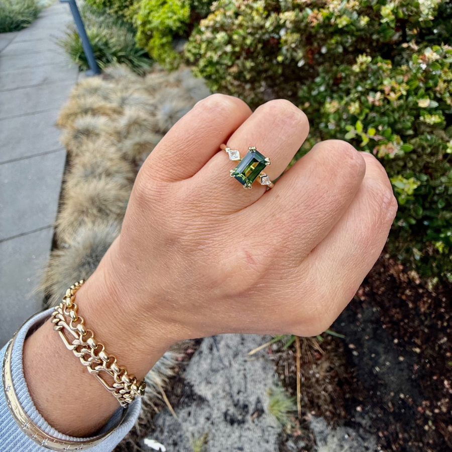 emerald cut green sapphire ring