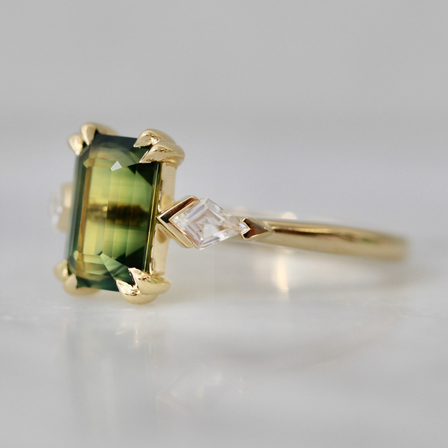 
            emerald cut green sapphire ring