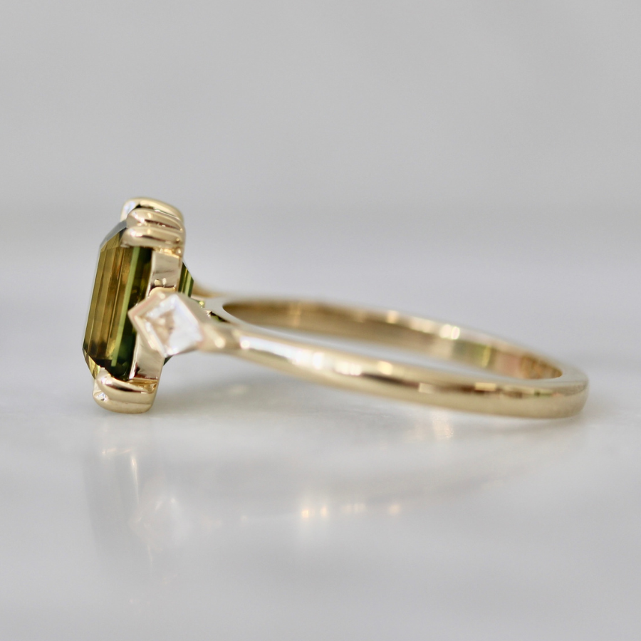 
            emerald cut green sapphire ring