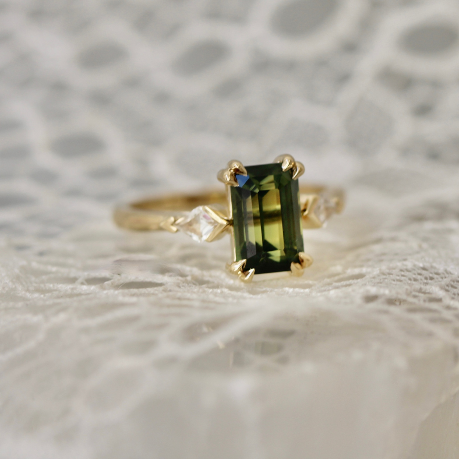 emerald cut green sapphire ring