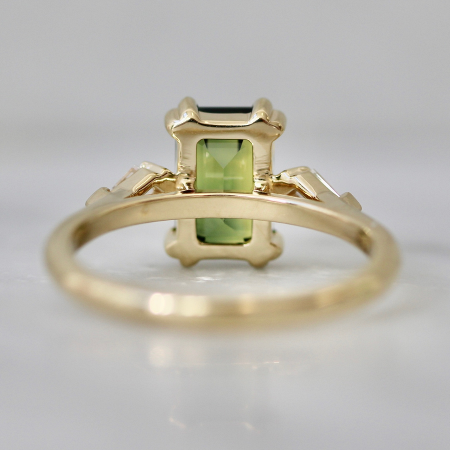 
            emerald cut green sapphire ring