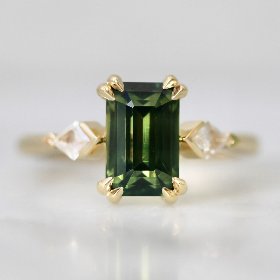 emerald cut green sapphire ring