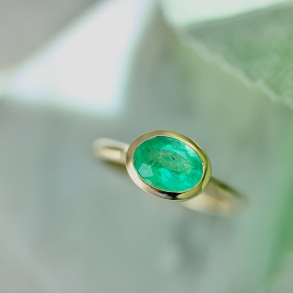 bezel emerald ring