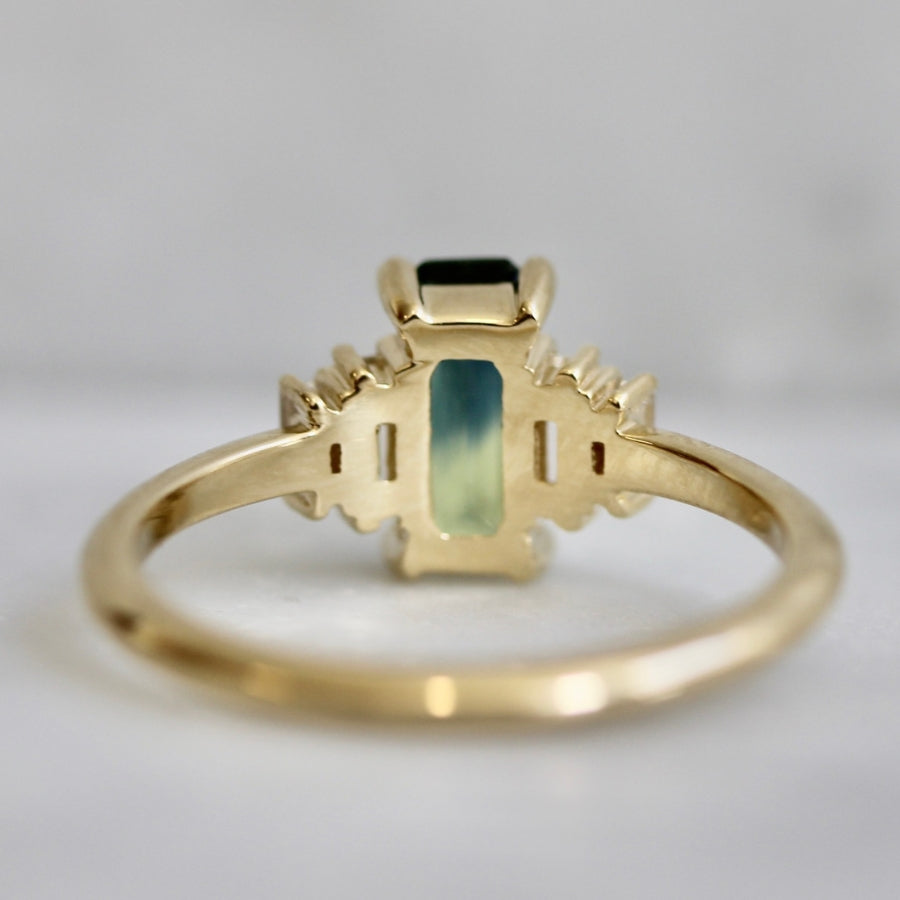 
            green-yellow emerald cut sapphire ring