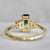 green-yellow emerald cut sapphire ring