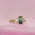 green-yellow emerald cut sapphire ring