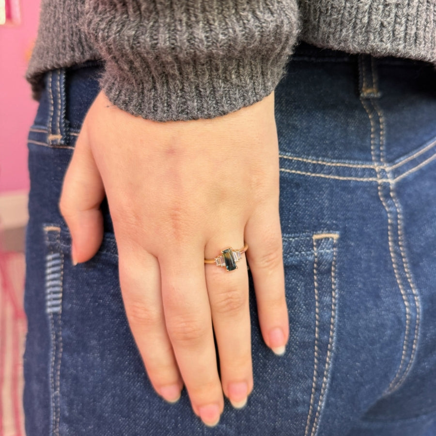 
            green-yellow emerald cut sapphire ring