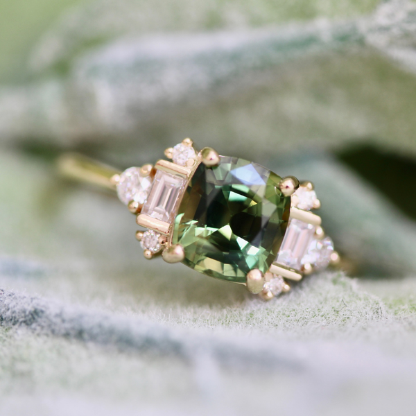 green cushion cut sapphire ring