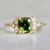 green cushion cut sapphire ring