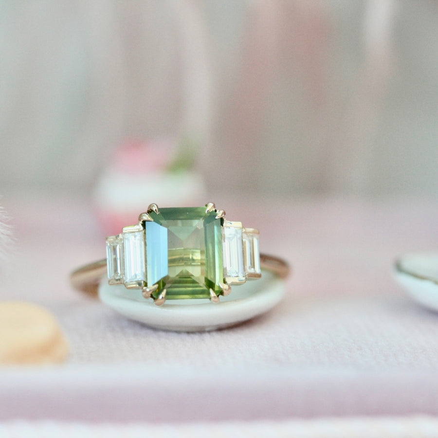 
            green emerald cut sapphire ring