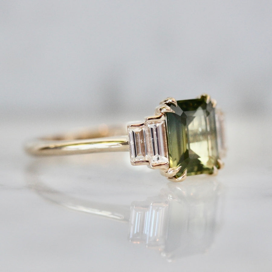 
            green emerald sapphire ring