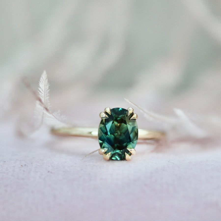 
            green oval sapphire engagement ring