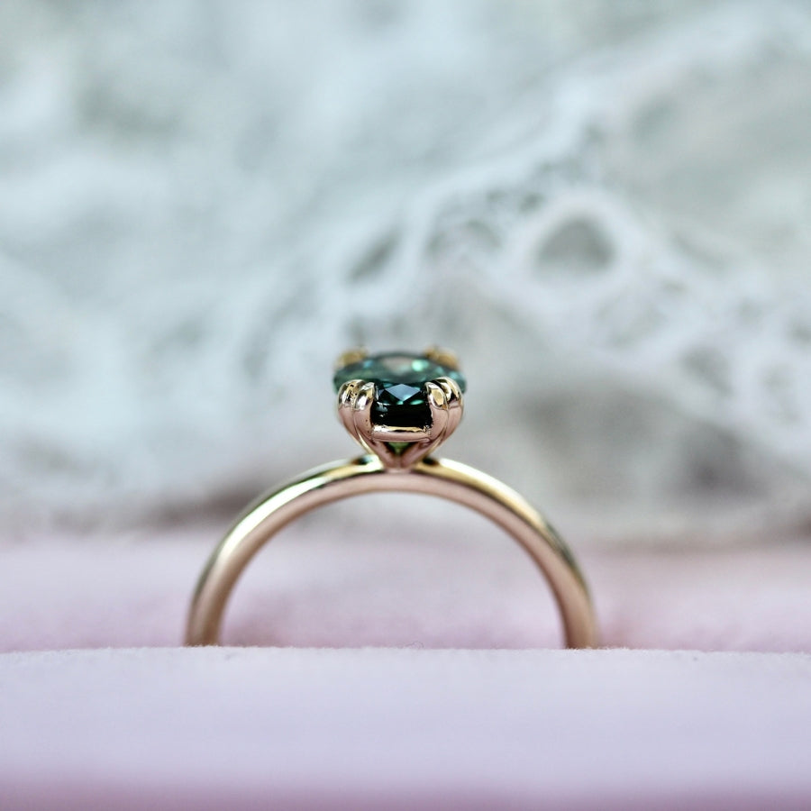 
            green oval sapphire ring