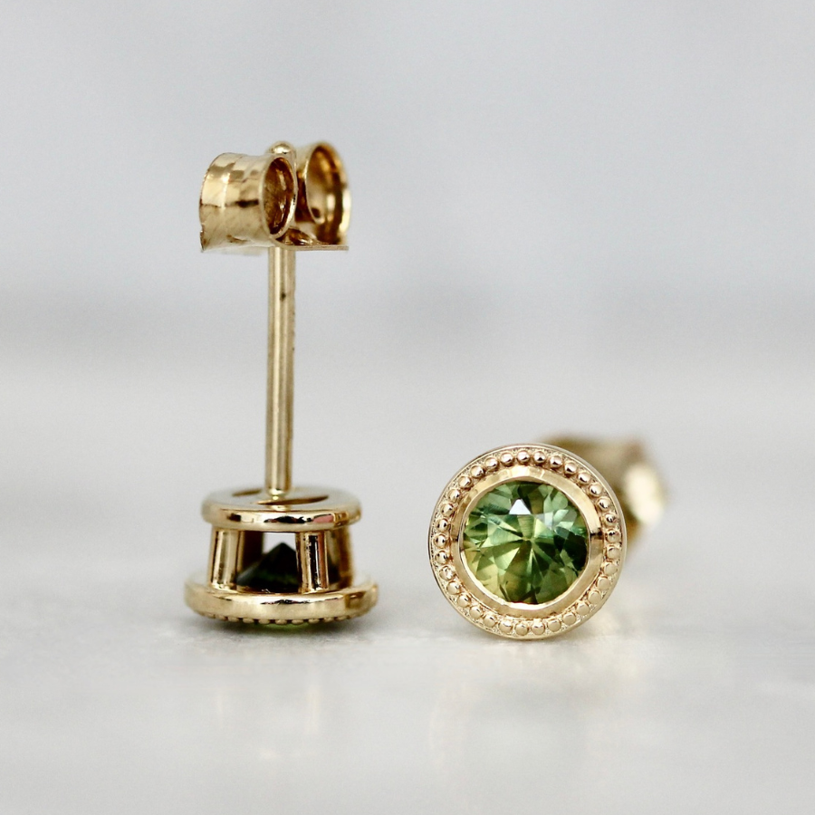 
            round green sapphire earrings