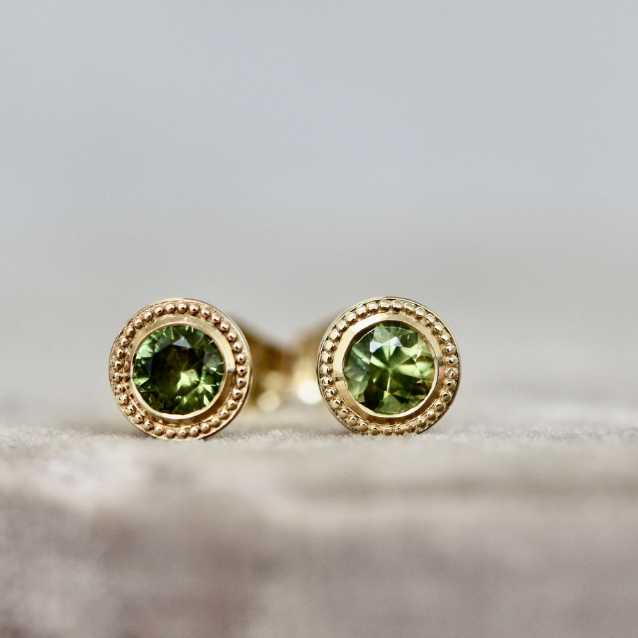 
            round green sapphire earrings