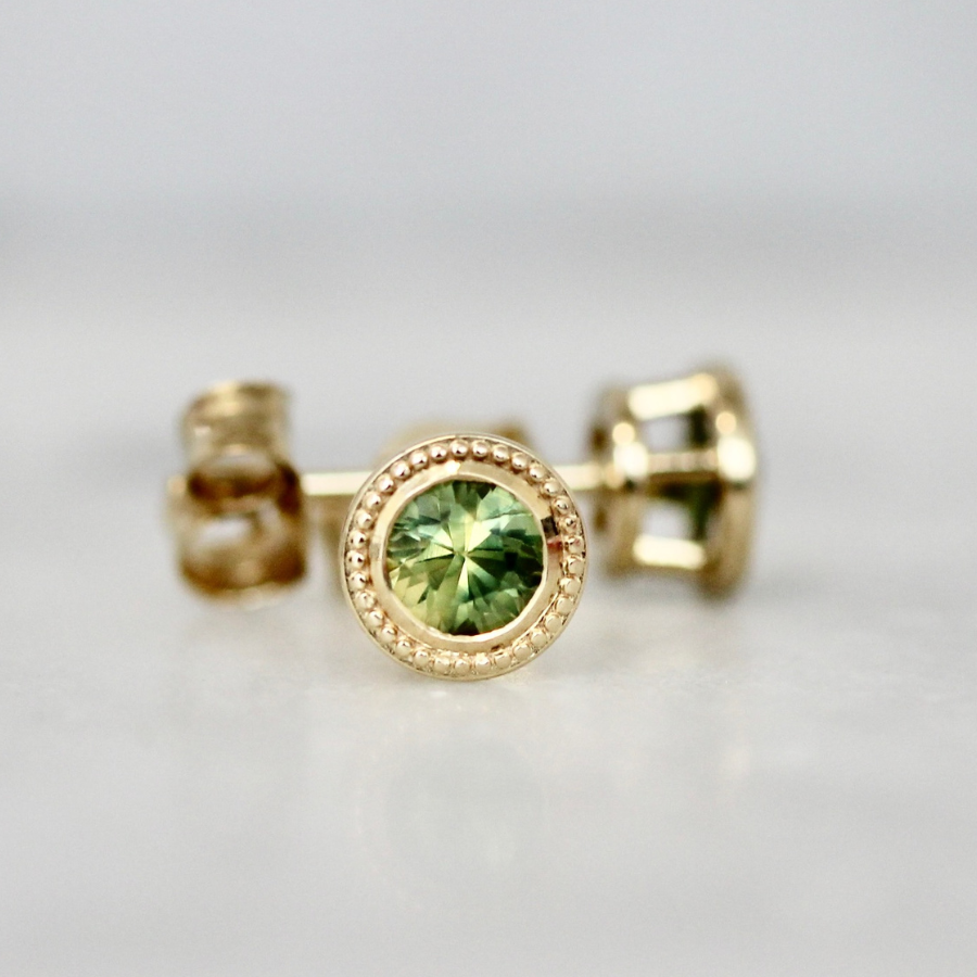 
            round green sapphire earrings