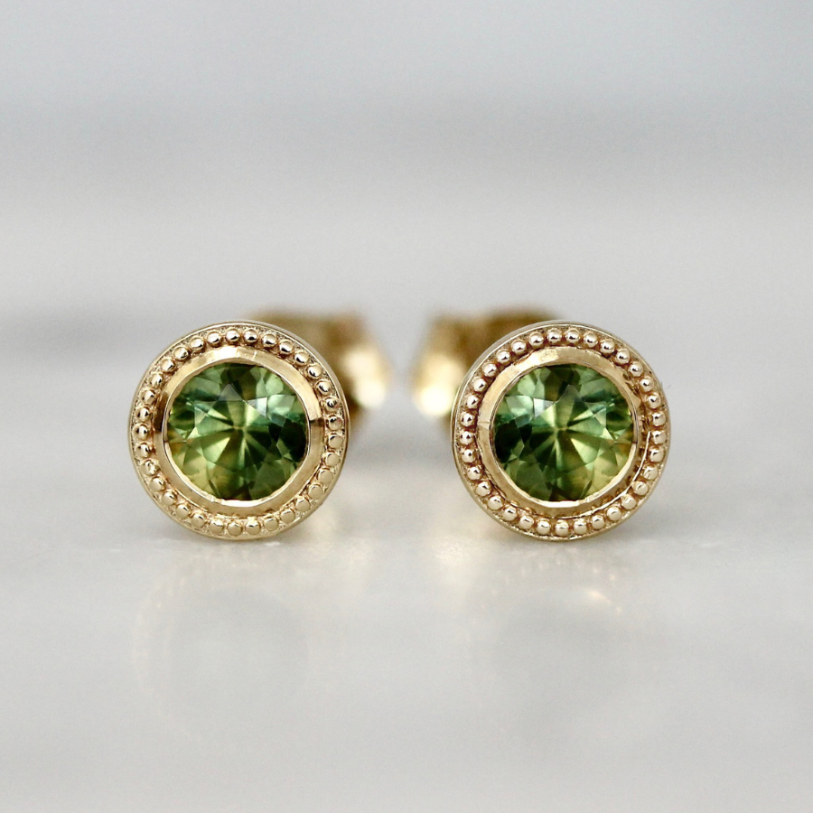 
            round green sapphire earrings