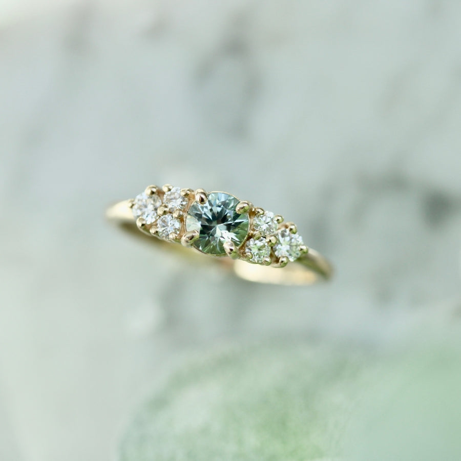 
            light green-blue sapphire ring