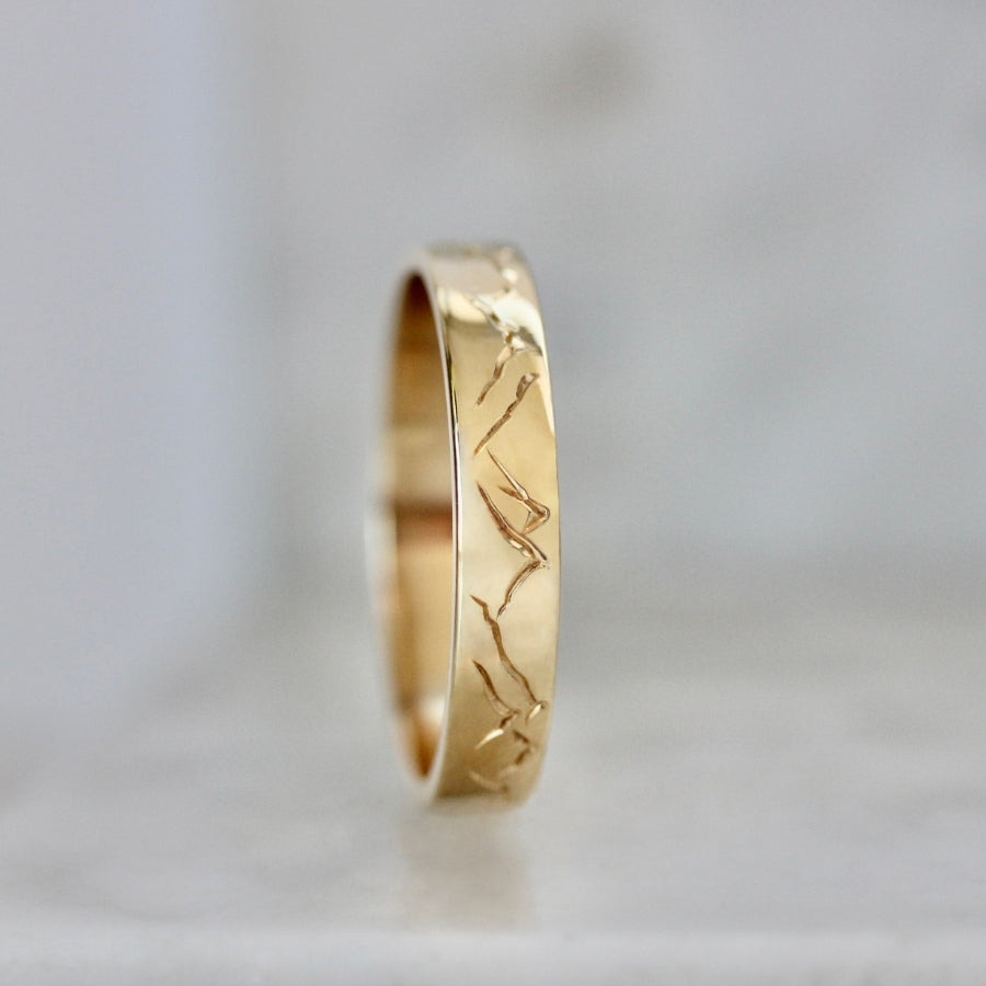 
            mountain engraved wedding band