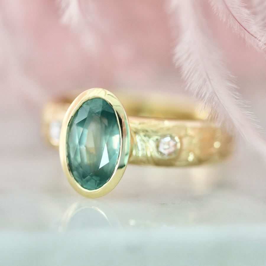 
            oval cut green Montana sapphire ring 