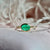 oval emerald engagement ring