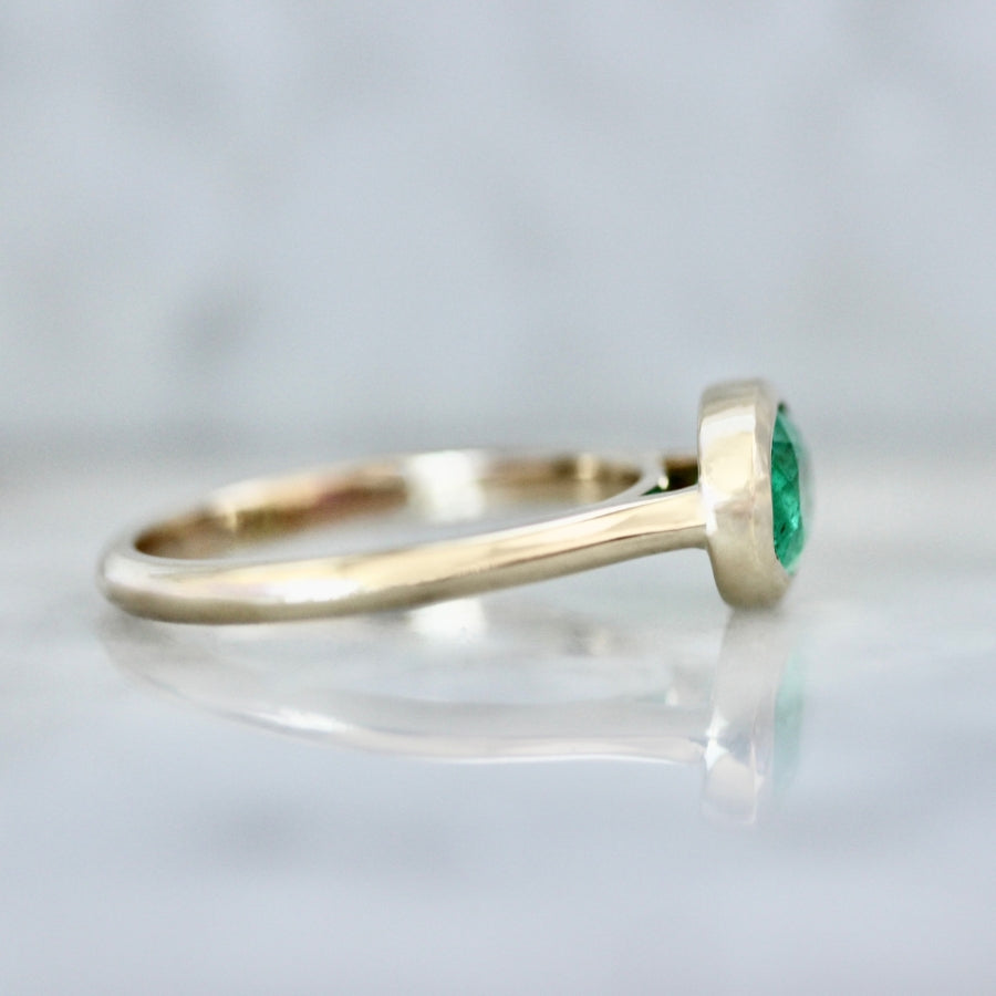 
            New Money Oval Cut Emerald Ring