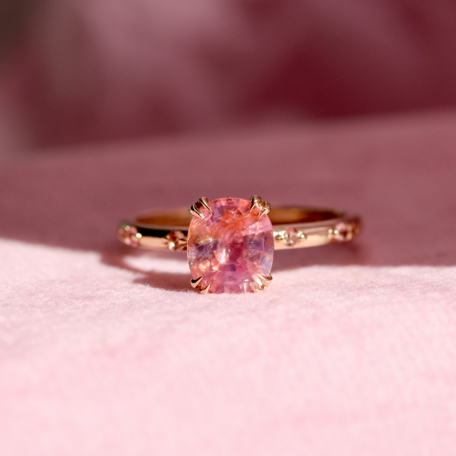 
            peach sapphire ring