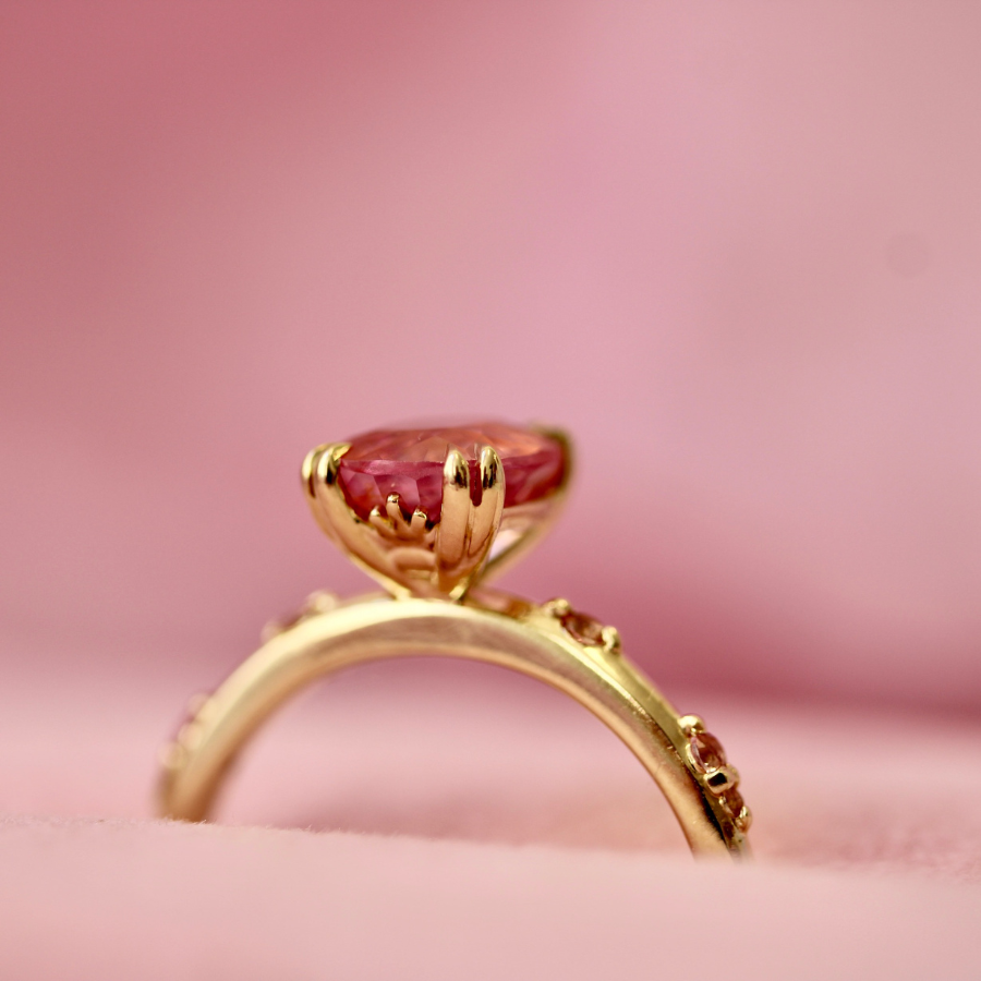
            peach sapphire ring