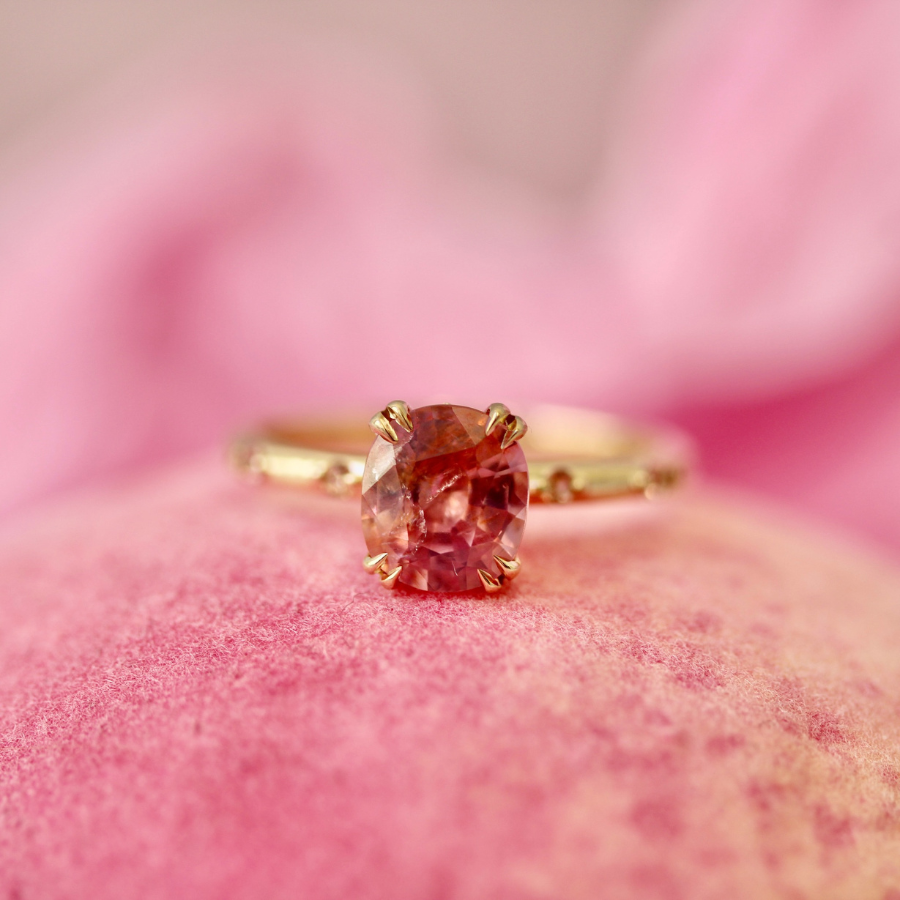 
            peach sapphire ring