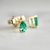 pear cut emerald earrings.