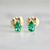 pear cut emerald earrings.