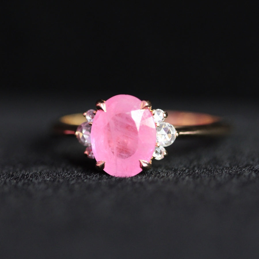 pink half diamond halo sapphire ring