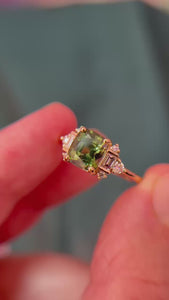 green cushion cut sapphire ring