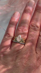 icy pear diamond engagement ring