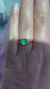 oval emerald engagement ring