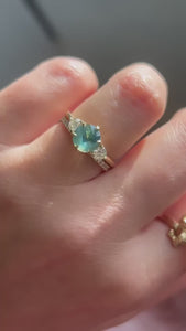 Foxtrot Teal Round Brilliant Cut Opalescent Sapphire Ring