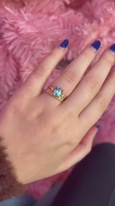 blue emerald cut sapphire ring