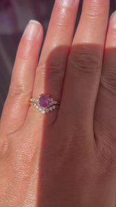 pink oval opalescent sapphire engagement ring