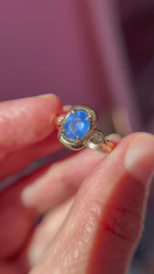 blue oval cut opalescent sapphire ring