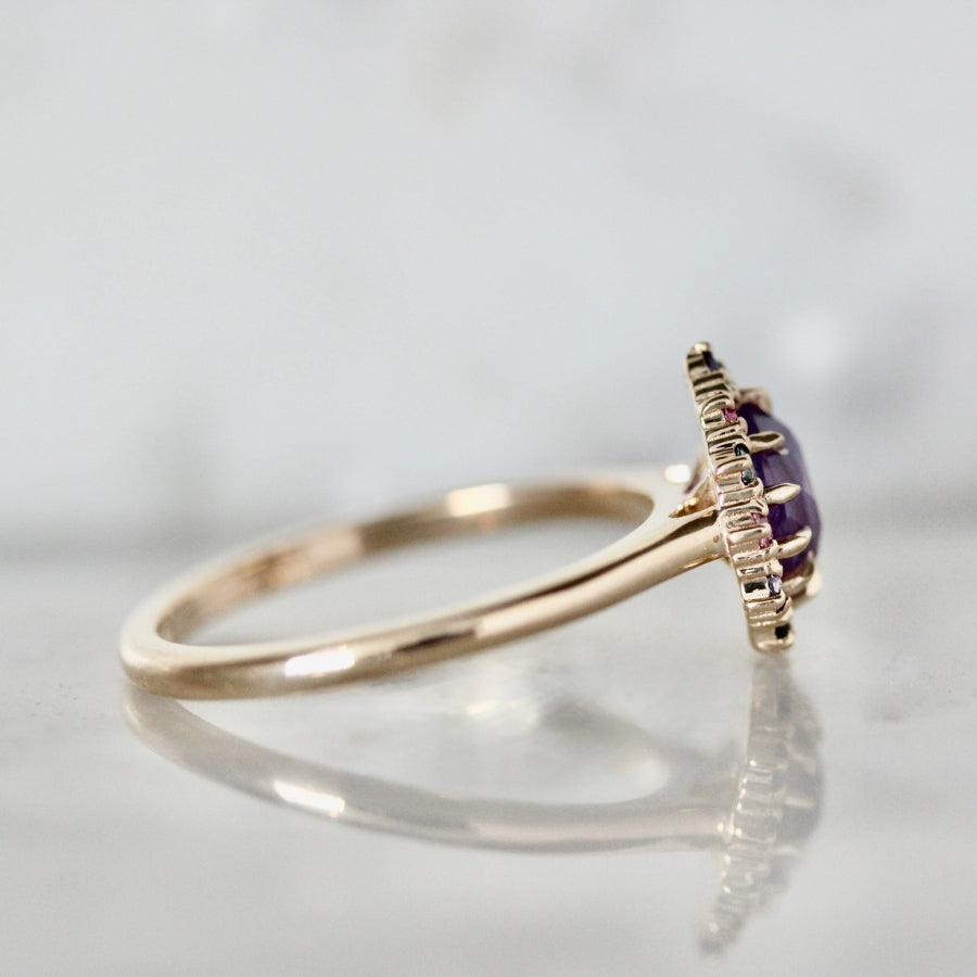 
            purple sapphire ring