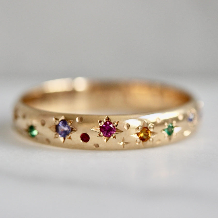 
            rainbow celestial star engraved band