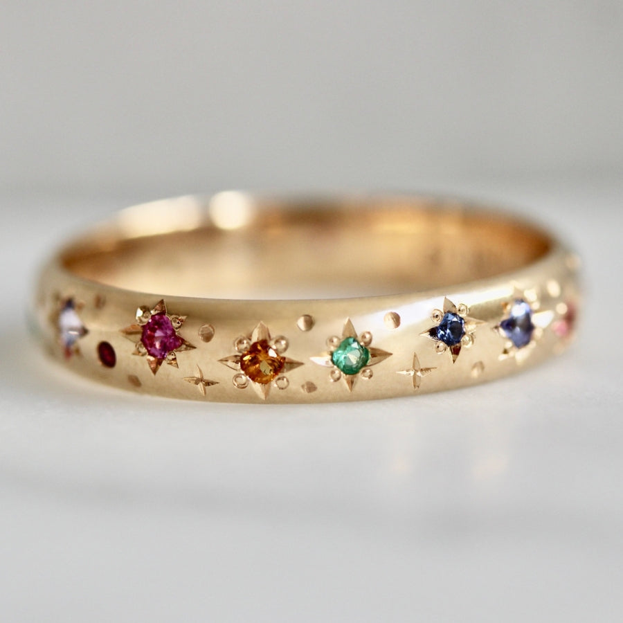 
            rainbow celestial star engraved band