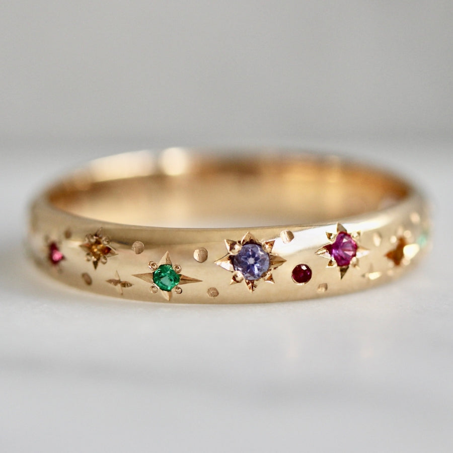 
            rainbow celestial star engraved band