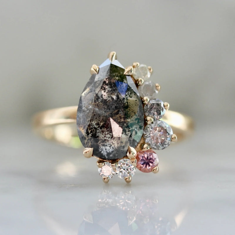 Salt and pepper pear cut asymmetrical diamond ring
