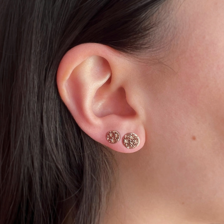 
            star engraved earrings rose gold