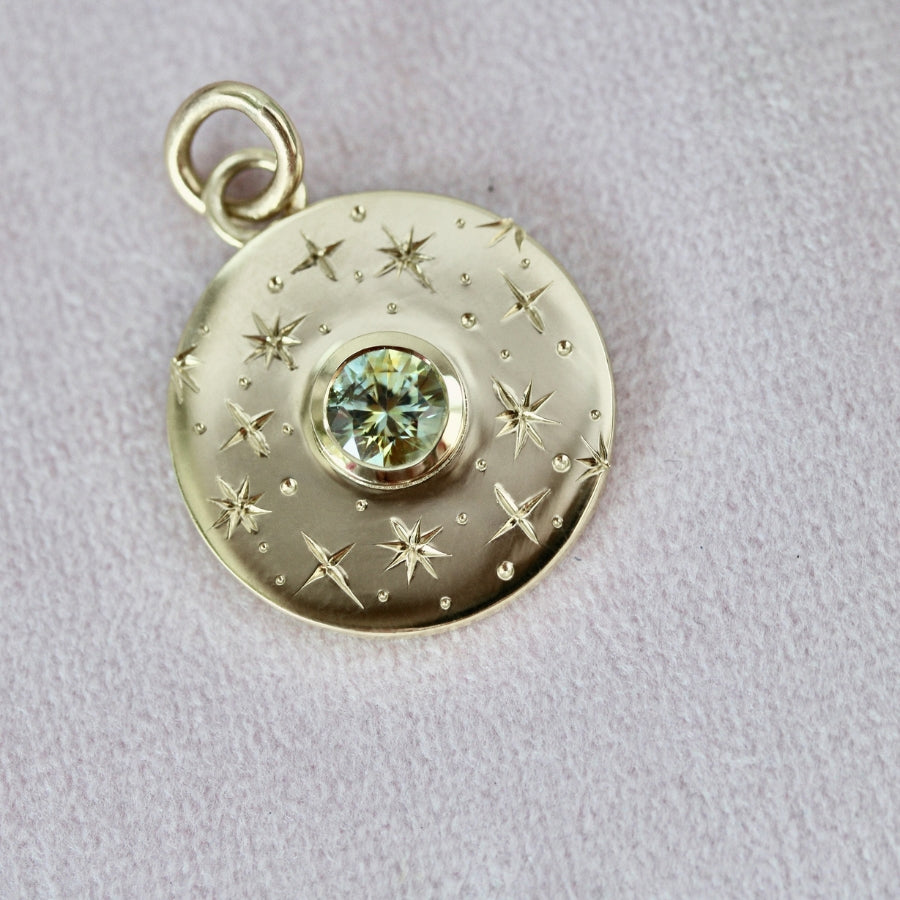 
            Guiding Star Engraved Montana Sapphire Pendant