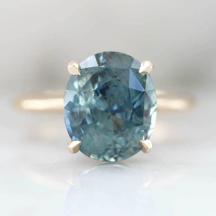 tael blue oval cut sapphire engagement ring
