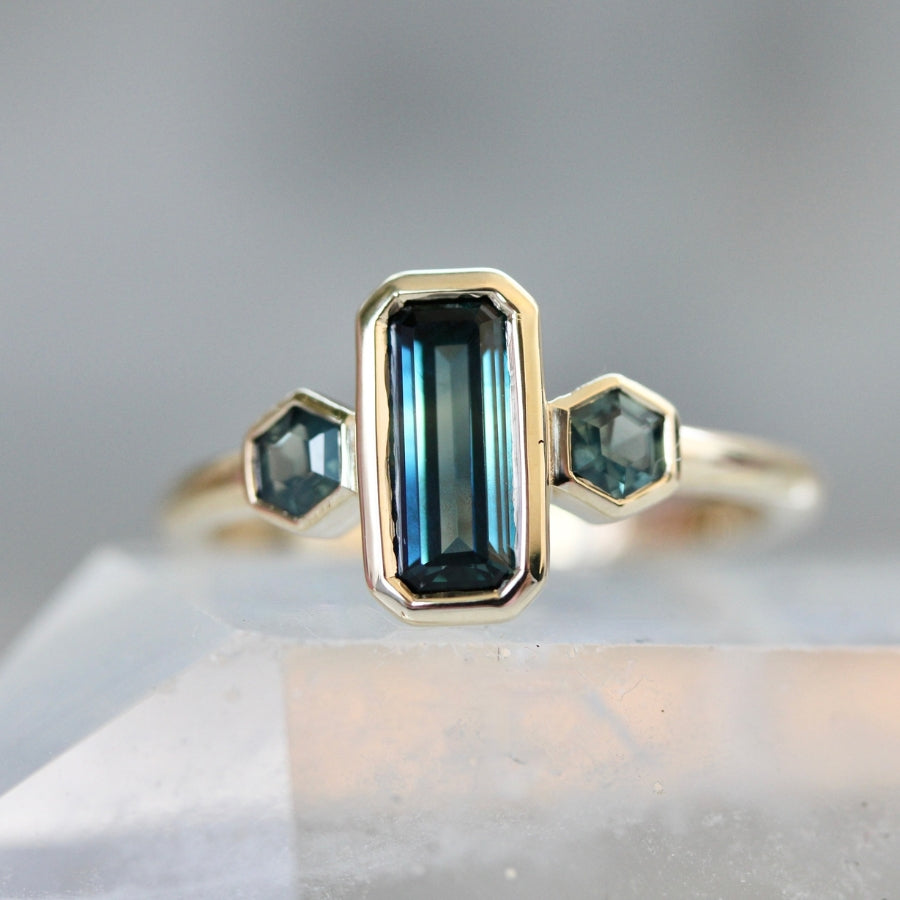 
            teal emerald cut montana sapphire ring