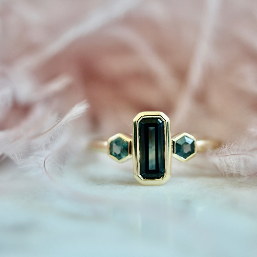 
            teal emerald cut montana sapphire ring