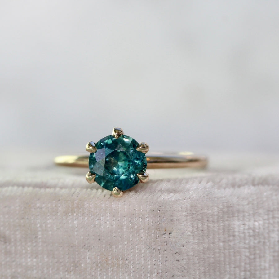 
            teal sapphire engagement ring